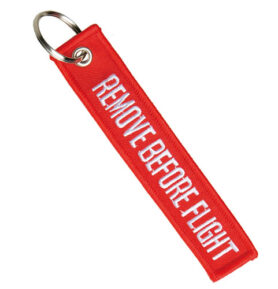 MIL-TEC klíčenka "REMOVE BEFORE FLIGHT" ČERVENÁ