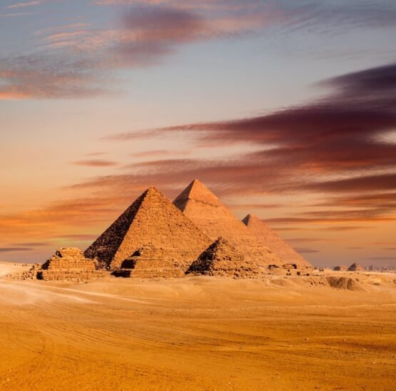 egypt_sunset-view-of-pyramid-complex-of-giza-in-cairo-2021-12-21-18-53-02-utc_resized